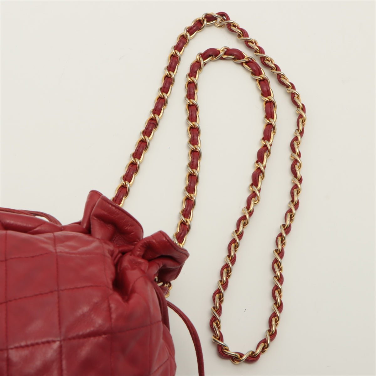 Mini Drawstring Bucket 1986-1988 Red Quilted Lambskin Gold