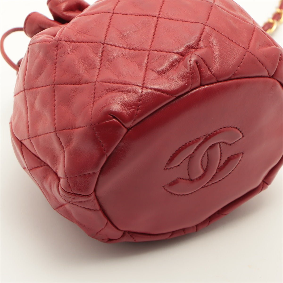 Mini Drawstring Bucket 1986-1988 Red Quilted Lambskin Gold