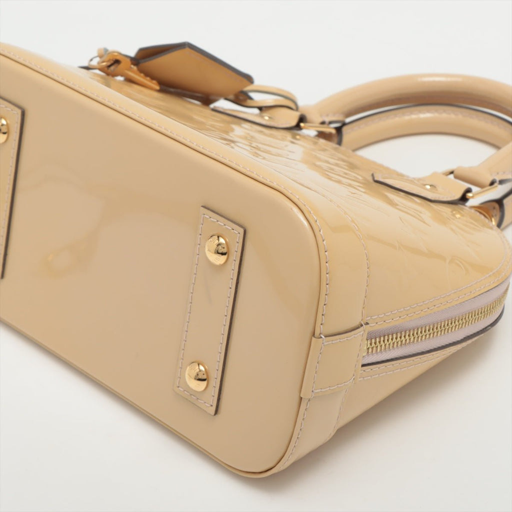 Alma BB Monogram Vernis Beige