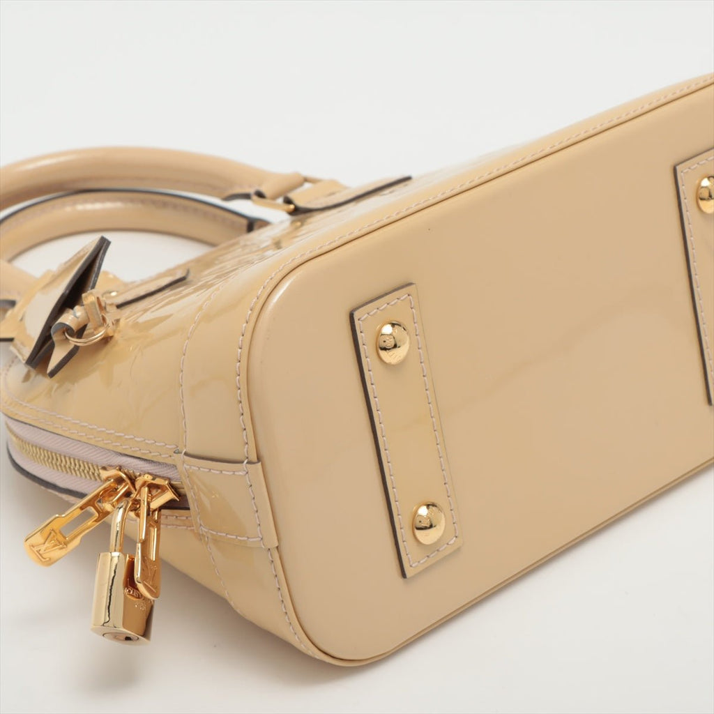 Alma BB Monogram Vernis Beige