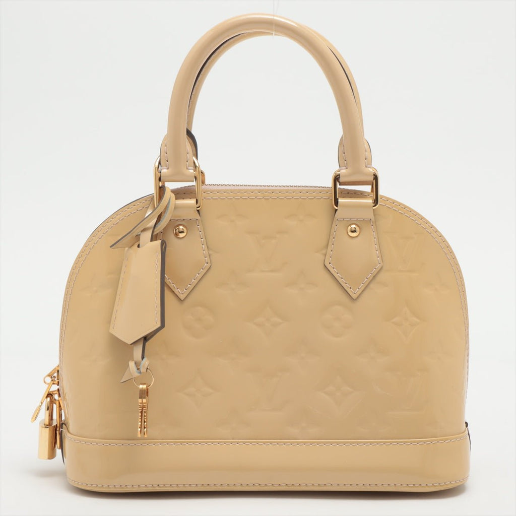 Alma BB Monogram Vernis Beige