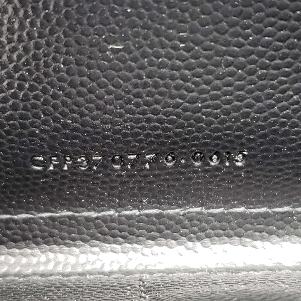 YSL Yves Saint Laurent Black Zippy Wallet